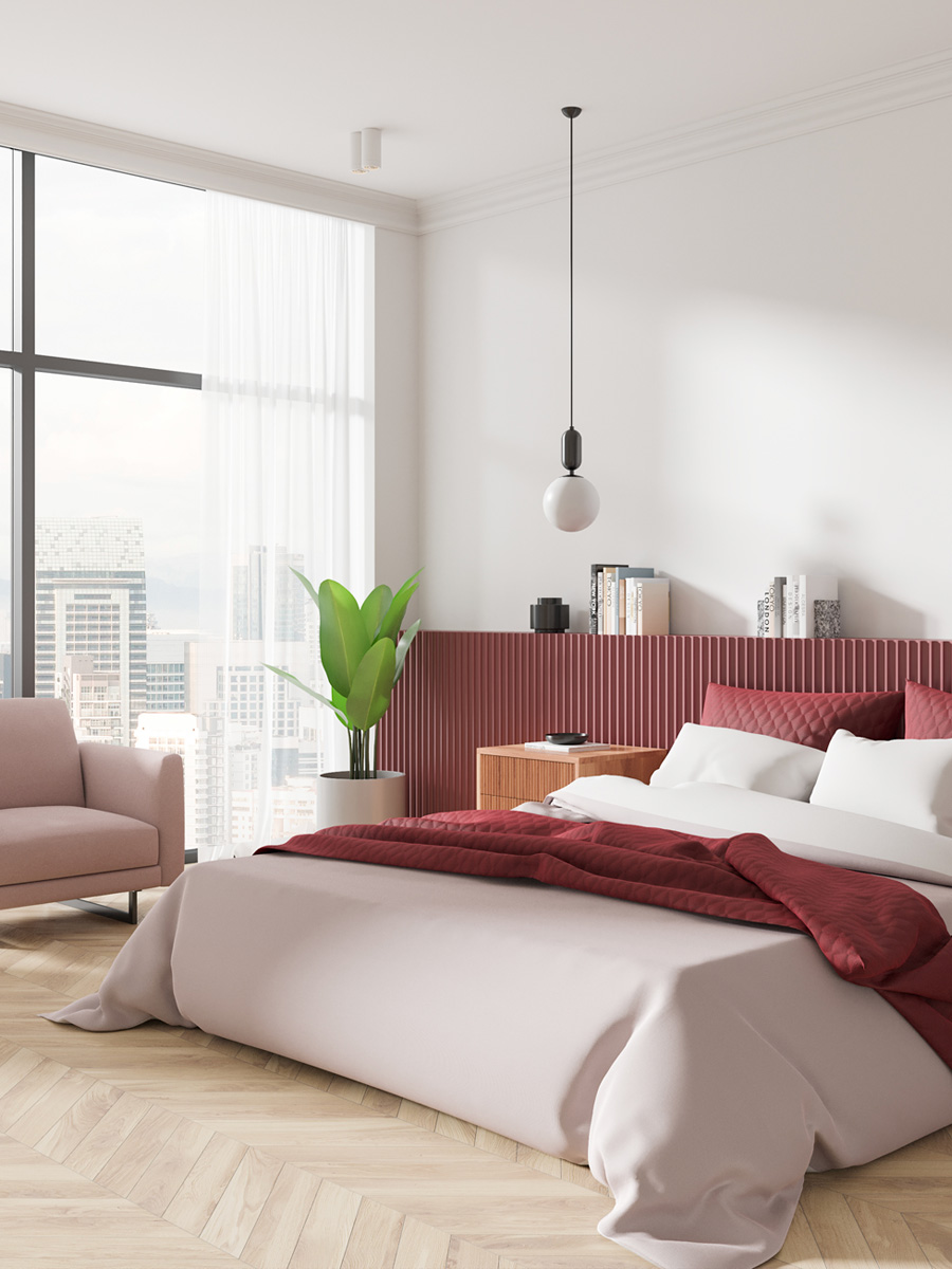 pink and red bedroom with natural beige engineered wood flooring